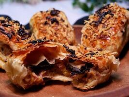 Bolen is a traditional cake or bread originating from Bandung, Indonesia. Bolen has a soft texture and is usually filled with various fillings such as banana, cheese, chocolate. photo