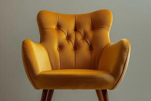 Chic modern chair with button tufts and angular wooden legs isolated photo
