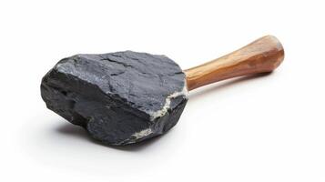 A heavy black stone tool with a wooden handle used for striking objects, displayed on a clean white background photo