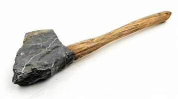 A handmade stone tool with a wooden handle from ancient times, showcasing traditional craftsmanship and functionality photo