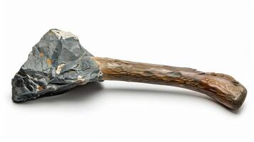 Ancient stone tool with a wooden handle, showcasing early human craftsmanship, displayed on a clean background photo