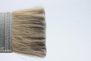 isolated blue handle paint brush photo