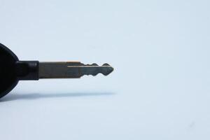motorcycle ignition key isolated on white background photo