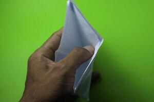 left hand holding an empty envelope photo