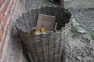 bamboo woven trash can photo