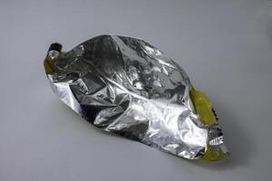 plastic foil waste from used snack wrappers photo