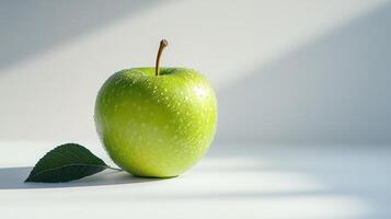 Fresh Green Apple with Leaf on White Background photo