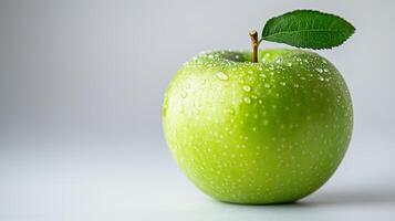 Fresh Green Apple with Water Drops Isolated on White Background photo