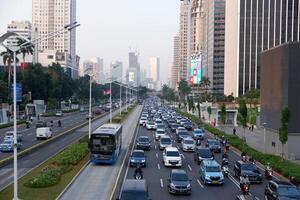 Jakarta traffic jam after office hours on weekdays in the new normal pandemic covid-19 Jakarta, Indonesia - June 29, 2020 photo