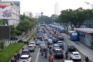 Jakarta traffic jam after on weekdays in the new normal of pandemic covid-19 in central of business office Sudirman street Jakarta, Indonesia - June 29, 2020 photo