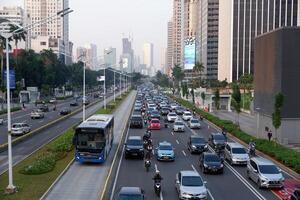 Jakarta traffic jam after on weekdays in the new normal of pandemic covid-19 in central of business office Sudirman street Jakarta, Indonesia - June 29, 2020 photo