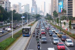 Traffic jam in the business center and offices main road of Jakarta after social restriction of pandemic Covid-19 Jakarta, Indonesia - July 28, 2020 photo