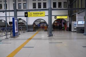 Arrival gate of Pasar Senen train station, Jakarta at night at Covid-19 pandemic. An empty arrival gate of train station Jakarta, Indonesia - August 2, 2020 photo