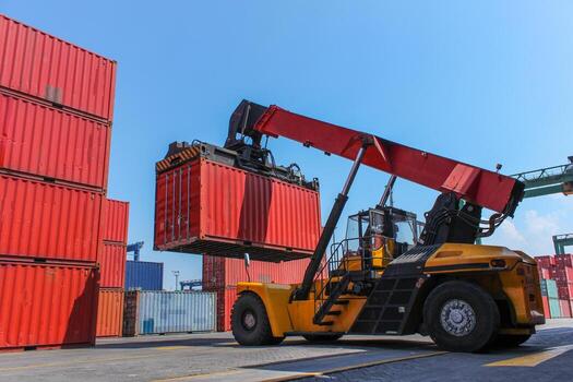 Loading and unloading shipping cargo with industrial crane. Export and import transportation. photo