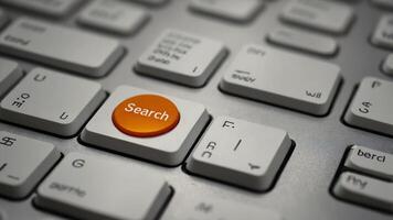 A computer keyboard with the word search on it photo