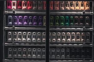 Stacked up colourful heating radiators on a front window display, Brighton, East Sussex, UK photo