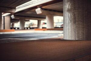 Parking lot under the bridge with few visible columns, Netherlands photo