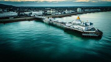 Aerial view of a Eastbourne pier on a cold but clear day with calm waters surrounding it, Eastbourne, East Sussex, UK photo