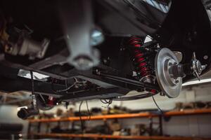Classic cars being restored in a vintage vehicle garage workshop photo