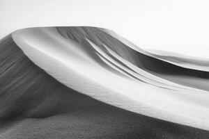 Wind patterns on the sand forming smooth curves, minimalistic desert scene photo