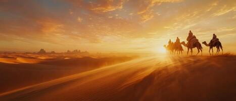 A camel caravan crossing vast desert dunes at dusk, warm light on the sand photo