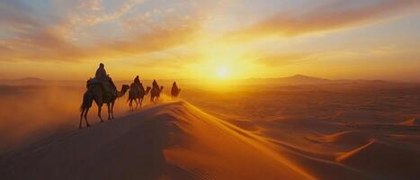 A camel caravan crossing vast desert dunes at dusk, warm light on the sand photo