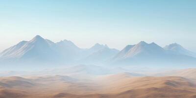 Distant mountains barely visible through desert haze, sand dunes in the foreground photo