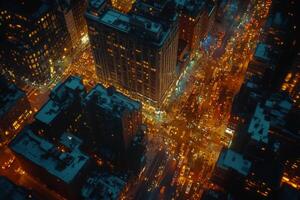 An aerial view of a vibrant city with busy streets and illuminated buildings, night scene photo