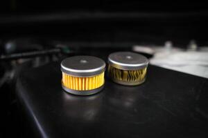 LPG or propane gas filters , CNG or LNG new a gas filters to replace worn out filters in the vehicle fuel system , Car repair concept photo