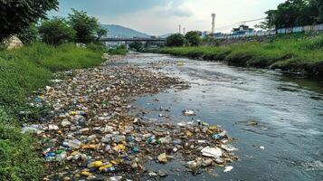 A river polluted with plastic and trash. photo
