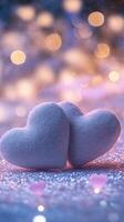 Romantic hearts made from fabric placed on glittering surface, surrounded by sparkling fairy lights and gentle heart-shaped bokeh, light pink and purple tones photo