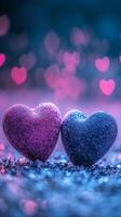 Two soft velvet hearts resting on a sparkling glitter surface, surrounded by glowing heart bokeh in the background, dreamy atmosphere with pink and purple tones photo