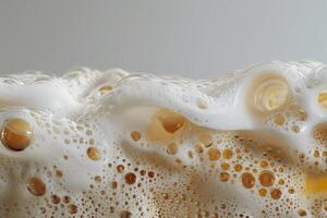 Close up of beer bubbles creating abstract design photo