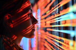 Woman looking at data flowing on digital screen in data center photo