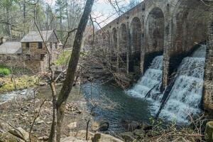 Backside of a old stone bridge photo