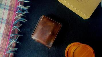 Leather Wallet on a Dark Surface photo
