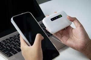 The concept of connecting to the internet with Pocket Wifi devices, wireless connection photo