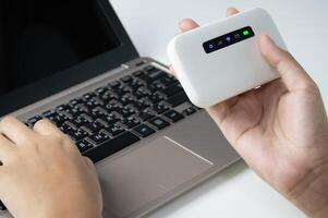 The concept of connecting to the internet with Pocket Wifi devices, wireless connection photo