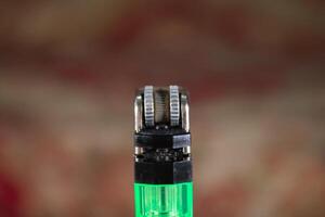 close up gas lighter blurred background photo