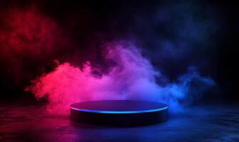A circular podium with neon blue light, illuminated by red and blue smoke against a black background. photo