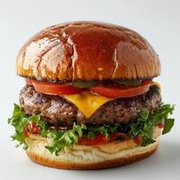 a close up of a hamburger with lettuce, tomato, and cheese photo