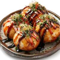three hot dogs covered in sauce and sprinkled with toppings photo