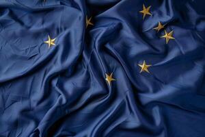 European union flag flowing with beautiful folds and golden stars photo