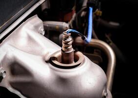 O2 sensor or oxygen sensor on exhaust pipe for measures the level of oxygen remaining from combustion in engine exhaust , Car parts concept photo