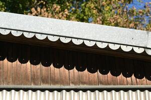 a close up of a building with a clock on it photo