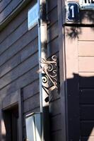 a street sign on a building photo
