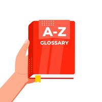 Hand holding a to z glossary red book vector