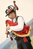 Bagpipe player from Bergamo photo