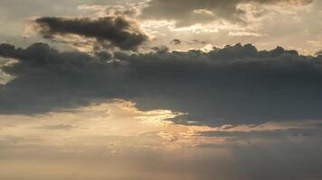 A man is standing on a hill with a cloud in the background video
