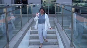 Asian fat woman with a bright face goes about her daily life, eating and walking happily. In the city and in buildings video